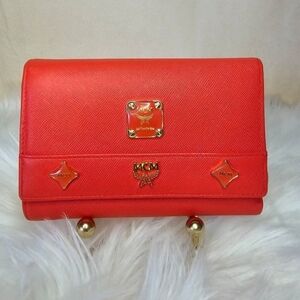 🧡🔹️ MCM 🔹️Orange Leather  Wallet with Gold Accents And Charm